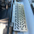 Accessory mounting plate installed on a Sprinter van dashboard.