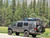 Black Ford E-Series van with an off-road rear bumper and swing arm system from Aluminess Products.
