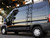 Black Dodge RAM Promaster van with a side ladder and roof rack from Aluminess Products.