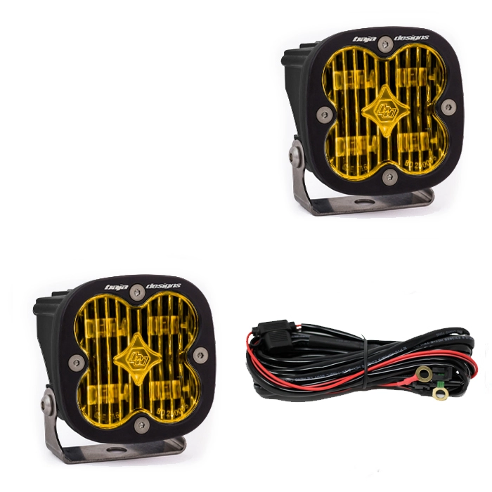 Set of Baja Designs Squadron Sport SAE lights with amber lenses and wiring kit.