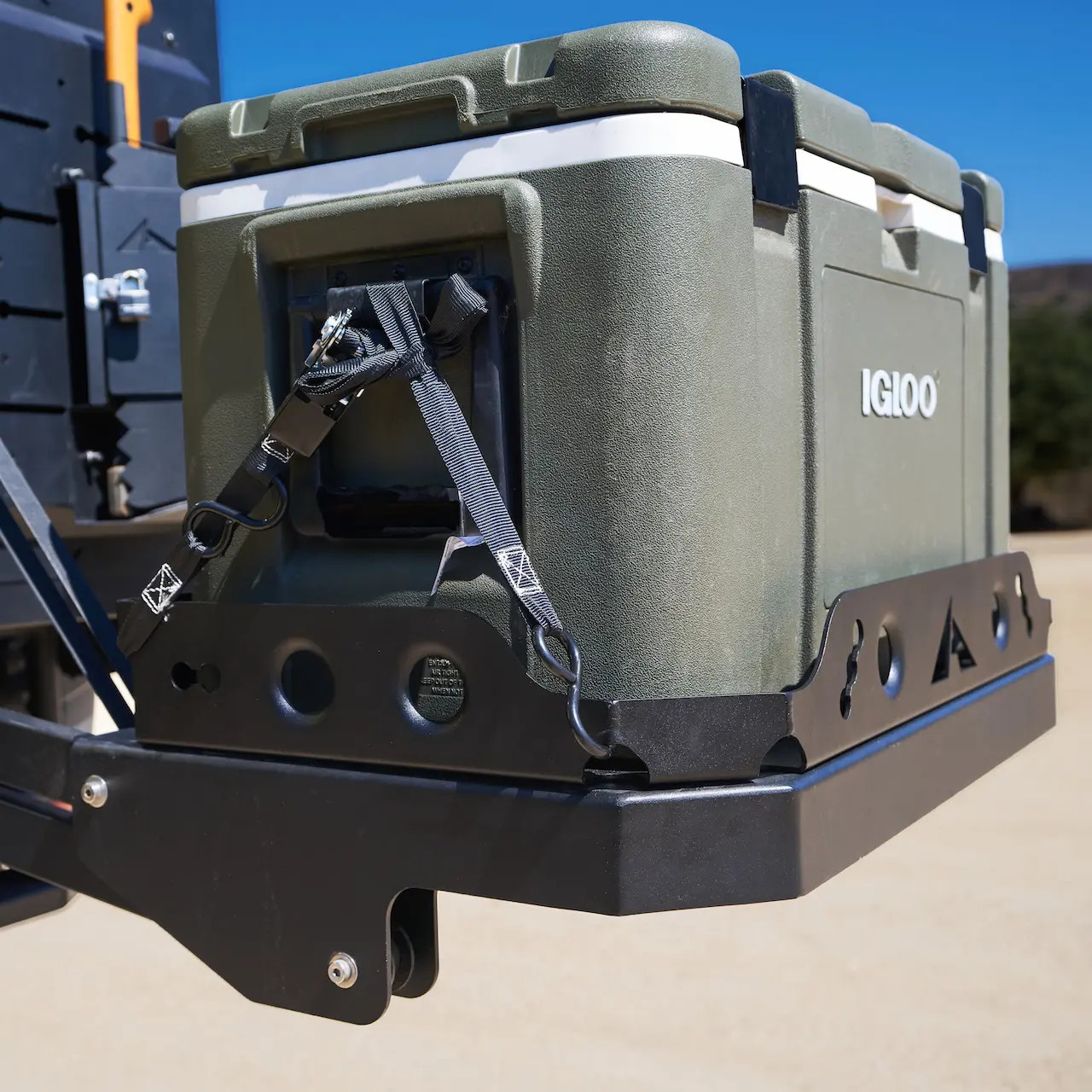 Close-up of the PowerLift Trail Caddy mounted to the rear of a vehicle.