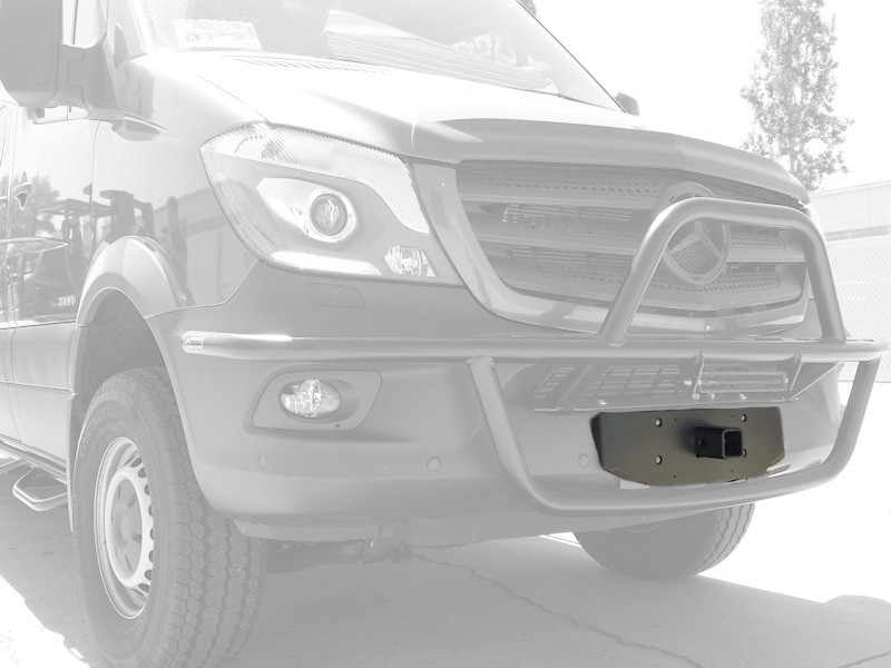 Close-up picture highlighting Aluminess Front Receiver Hitch parked on a Mercedes Sprinter van.