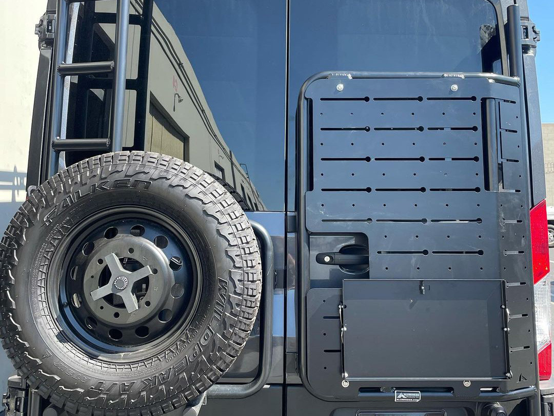 Aluminess BackPACK rear mounting plate equipped on a green Ford Transit van.