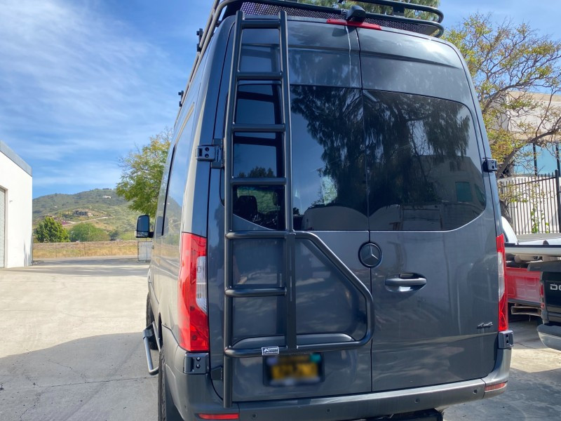 Mercedes Sprinter van featuring Aluminess Rear Door Ladder rack system.