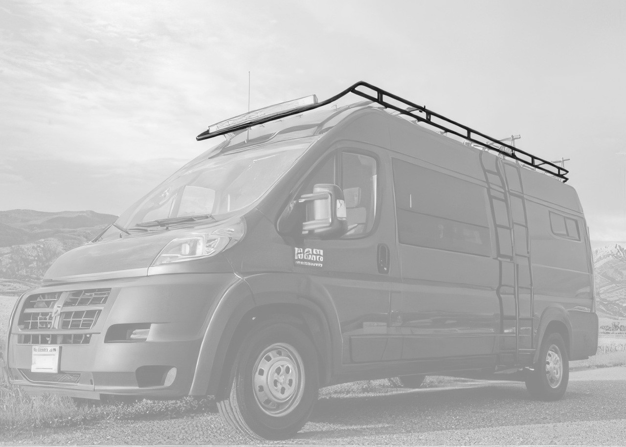 Black Dodge RAM Promaster highlighting Aluminess Touring Roof Rack in the desert.