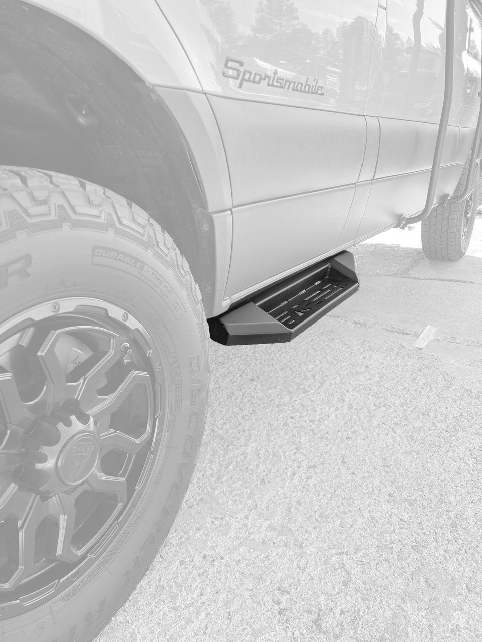 Close-up picture featuring an Aluminess Touring Side Steps for Mercedes Sprinter vans.