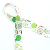 Apples of red and green tossed with brown apple seeds on 5/8" white single face satin ribbon on a 10 yard spool