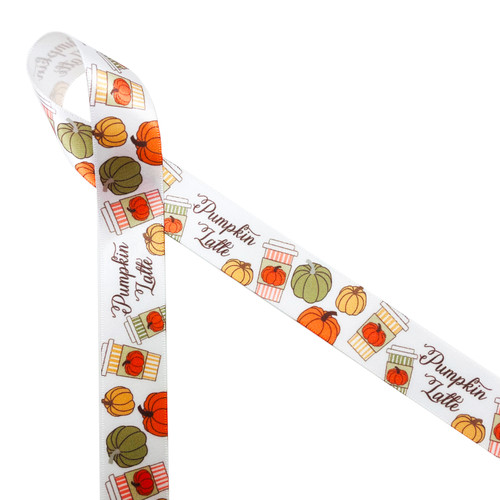Pumpkin Latte ribbon featuring Pumpkin Latte in brown script with orange and green striped coffee cups and pumpkin sleeves with tossed pumpkins of orange, green and tangerine printed on 7/8" white satin is an ideal ribbon indulging the pumpkin spice lover in your life. This is a fun ribbon for gift wrap, gift baskets, party favors, cookies, coffee shops, candy shops and cake pops. Have this ribbon on hand for Fall crafts like quilting, sewing and scrap booking. All our ribbon is designed and printed in the USA