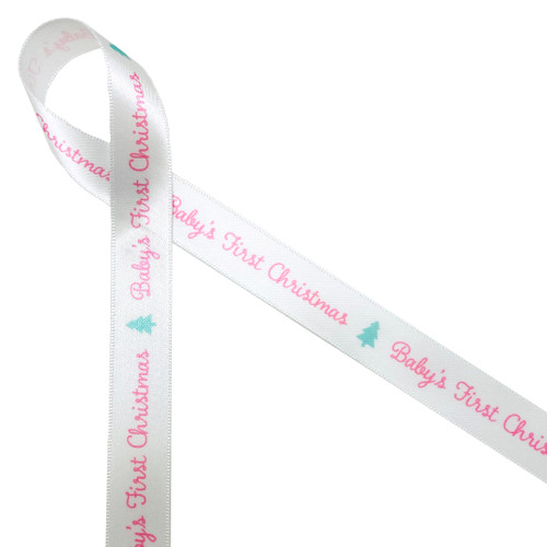 Baby's first Christmas ribbon in pink with a  mint green Christmas tree printed on 5/8" white single face satin is perfect for Baby's first special celebration. This pastel ribbon is perfect for gift wrap, gift bags, tree trimming, tree ornaments, Christmas crafts, sewing and quilting projects. All our ribbon is designed and printed in the USA
