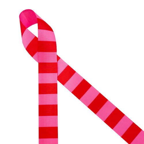 Red and hot pink stripes printed on 7/8" hot pink ribbon is a bold stated ribbon perfect for so many occasions. This is a great ribbon for Valentine's Day, Mother's Day and all occasions in Spring and Summer. This fun ribbon is perfect for gift wrap, gift baskets, party favors, party decor, crafts, sewing and quilting projects too! All our ribbon is designed and printed in the USA
