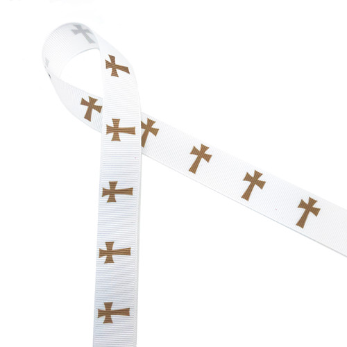 Gold crosses are traditional symbol of Christianity. Gold crosses in a row printed on 7/8" white grosgrain is the ideal ribbon for Christian celebrations, sacraments and ceremonies. This is an ideal ribbon for Easter celebrations, First Communion, Confirmation, Weddings and Funerals. Use this ribbon for gift wrap, gift baskets, ceremony decor, ribbon crafts, wreath making, sewing and quilting. All our ribbon  is designed and printed in the USA.