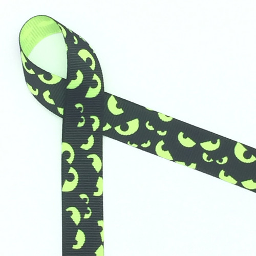 Spooky eyes in neon green on a black background printed on 5/8" neon green ribbon, 10 Yards