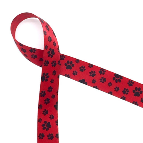 Paw prints in black on 5/8" red single face satin ribbon, 10 Yards