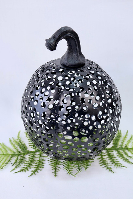 Black Pumpkin With Cutouts Black Pumpkin With Cutouts