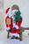 Primitive Nicholas Doll Holding Tree
