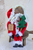 Primitive Nicholas Doll Holding Tree