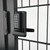 Double-sided gate lock with delta handle mounted onto a black metal gate