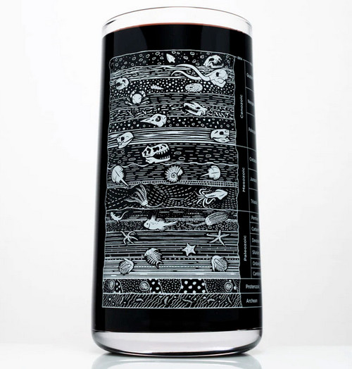 Drinking glass with earth's stratigraphy showing development of life in various eras