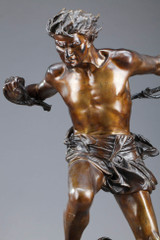 Bronze of a prisoner who has just freed himself from his bonds