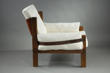 Wooden armchair with cream fabric