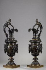 Pair of bronze ewers with two patinas