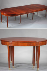 TABLE OVALE DE STYLE DIRECTOIRE A ALLONGES EN PLACAGE D'ACAJOU TABLE OVALE DE STYLE DIRECTOIRE A ALLONGES EN PLACAGE D'ACAJOU