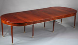 TABLE OVALE DE STYLE DIRECTOIRE A ALLONGES EN PLACAGE D'ACAJOU TABLE OVALE DE STYLE DIRECTOIRE A ALLONGES EN PLACAGE D'ACAJOU