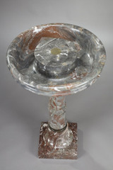 Grey and red marble bird bath