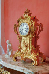 Reloj rococó en bronce dorado y cincelado, Raingo et Frères