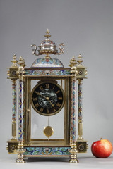 Clock in the form of a glass cage