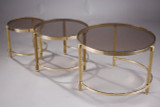 Design table in glass and gold metal