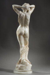 Young nude woman in alabaster