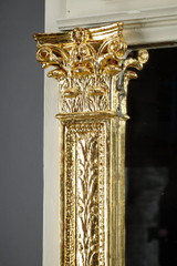 Large freestanding mirror in wood and gilded stucco