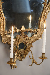 Miroirs candélabres en bois doré et sculpté