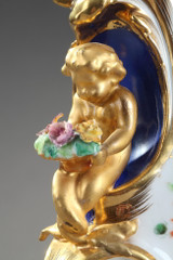 Rocaille porcelain clock, 19th century