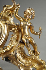 Pair of andirons with two putti