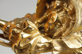 Gilded bronze lamp sculpture of a woman carried away with her umbrella