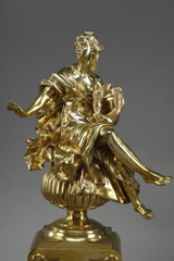 Gilded bronze sculptures on andirons