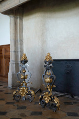 VERY LARGE PAIR OF WROUGHT IRON FIREPLACE FRONTS WITH FOLIAGE DECORATION, MASK AND SCROLLS
