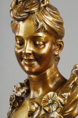 Scultura in bronzo patinato, busto femminile su marmo del XIX secolo.