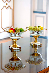 PAIR OF PARIS PORCELAIN BASKETS ON FEET, EMPIRE PERIOD