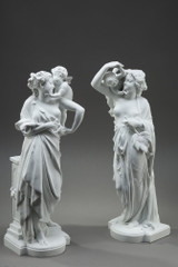 Pair of white porcelain biscuit sculptures