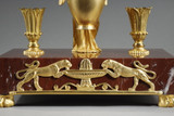 Inkish in gilded bronze and red cherry marble, Empire period, early 19th century