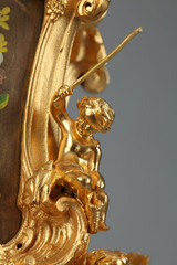 Reloj rococó en bronce dorado