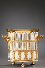 Gilt porcelain clock in the shape of a vase, early 19th century