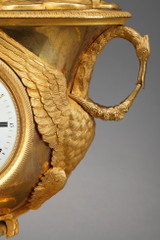 Empire period clock with a putto in a chariot