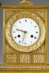 Detail of the figurative decoration of an Empire style clock