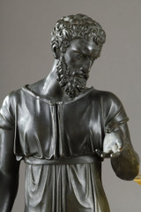 Antique clock inspired by Greek mythology