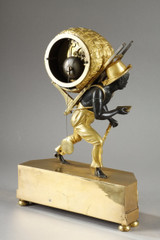 Händleruhr mit schreitender Figur und Stab