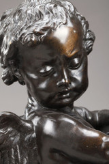 Bronze Amours se disputant un coeur